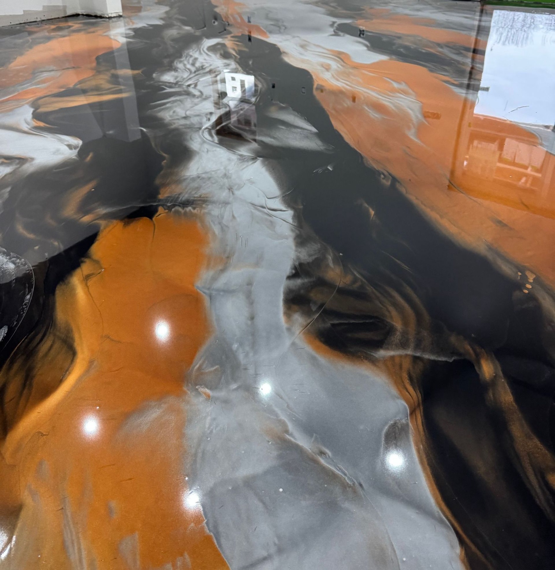 Marbled metallic epoxy floor by Armor Floors Systems